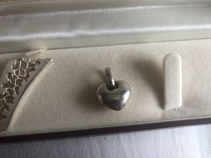 4 silver pendents