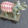 Beautiful Elephant on Metal Wheels Image 3
