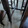 Vintage round nest of tables central round table four pie slice nesting tables tucked underneath Image 9