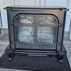 Electric Fire .. Free Standing.