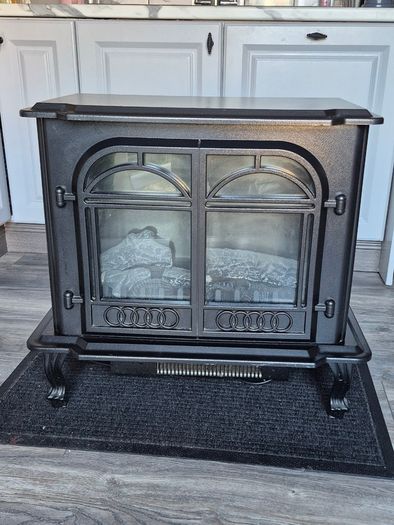 Electric Fire .. Free Standing.