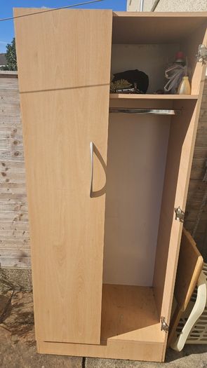 Wardrobe. One door is broken.