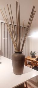 Large Ceramic Floor Vase with Tall Bamboo Sticks