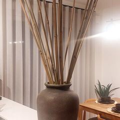 Large Ceramic Floor Vase with Tall Bamboo Sticks