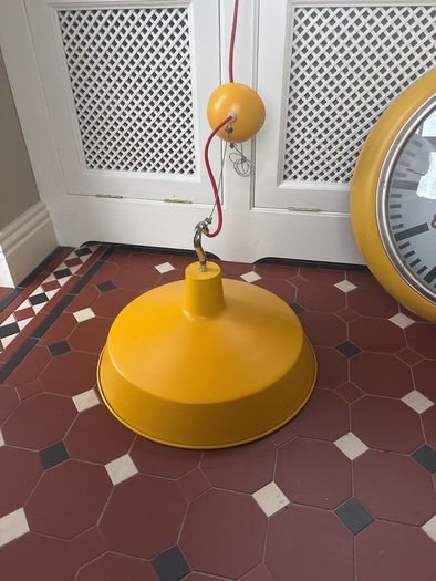 large clock and pendant light