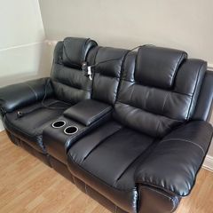 2 seater console sofa with power recliners