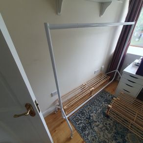 Two Clothes Rails and Four Wooden Shoe Racks