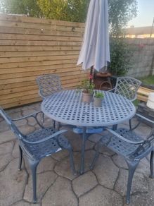 cast iron table and 4 chairs