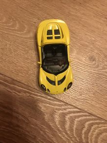 Toy car welly yellow 2009 lotus elise in