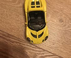 Toy car welly yellow 2009 lotus elise in