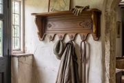 Old Carved wood coat hanger with shelf.