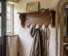 Old Carved wood coat hanger with shelf.