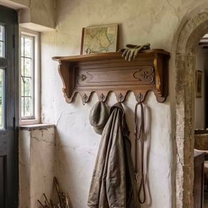 Old Carved wood coat hanger with shelf.