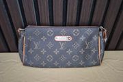Louis vuitton vintage eva clutch