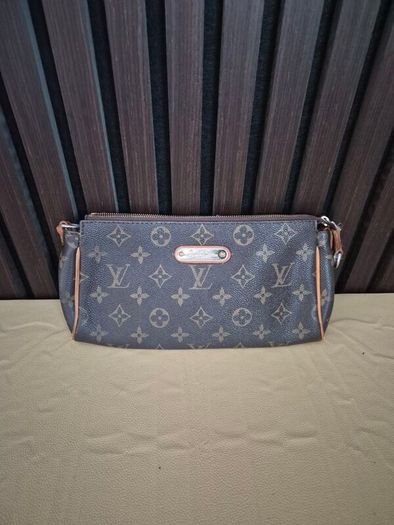 Louis vuitton vintage eva clutch