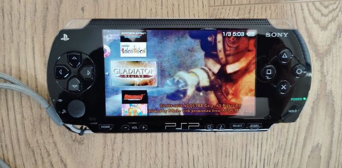 Psp 1000 Modded 64gb 40 psp original charger Excellent condition