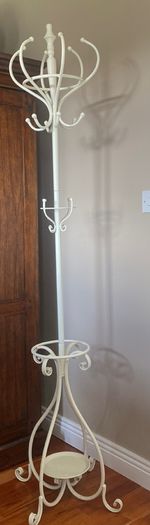 Cream coat umbrella and handbag rack