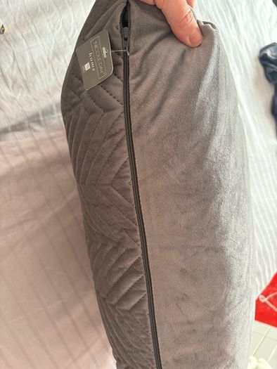 2 grey cushions