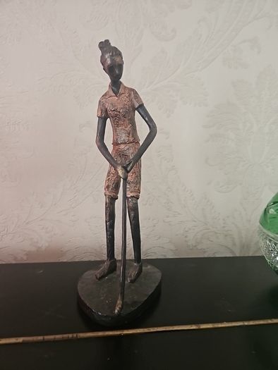 wroth iron woman golfer