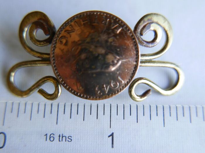 Vintage Twisted brass and Copper Foreign Coin Pin