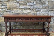 Early 20th Century Jacobean Revival Carved Oak hall table.