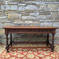 Early 20th Century Jacobean Revival Carved Oak hall table.