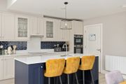Three mustard yellow high stools