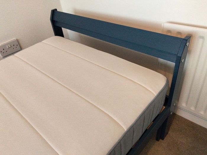 Single Ikea Neiden wooden bed, blue, with mattress