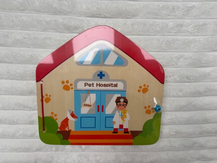 Hape E3016 Magnet Book Visit the Vet Damaged box Please see pictures