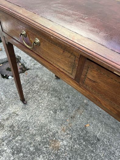 Maghoney wine leather desk with 2 drawers. Inlaid