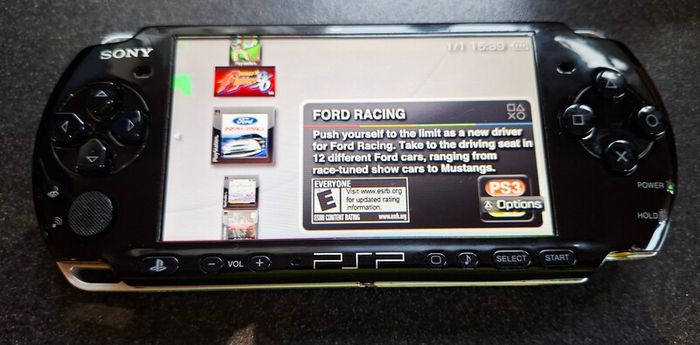 Modded Black PSP Slim 3000 128GB with games