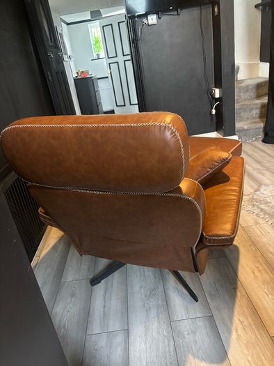 Practically new armchair and footstool