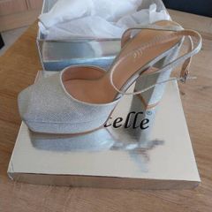 Size 5 or 38 worn once as new