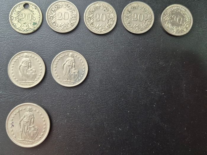 Swiss coins, including silver examples