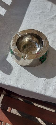 Heineken metal ashtray ,used condition, still nice condition ,buyer collects or pays postage thank you, sold as is,