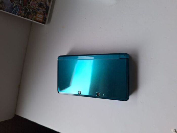 Aqua Blue Nintendo 3DS with games