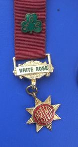 ORDER OF THE LADIES GLADE (OLG) - PRIMA degree White Rose member's medal (1978). Inscribed with recipient's name. A scarce medal.