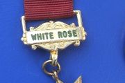 ORDER OF THE LADIES GLADE (OLG) - PRIMA degree White Rose member's medal (1978). Inscribed with recipient's name. A scarce medal.