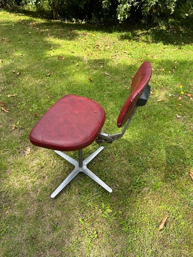 Vintage red swivel and tilt office chair
