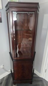 Corner glass cabinet (bought in 1983) in immaculate condition