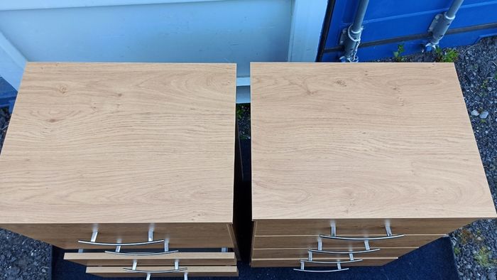 Two matching chest of drawers   oak finish