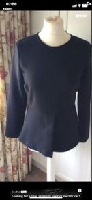 top zara black suiting fabric with peplum