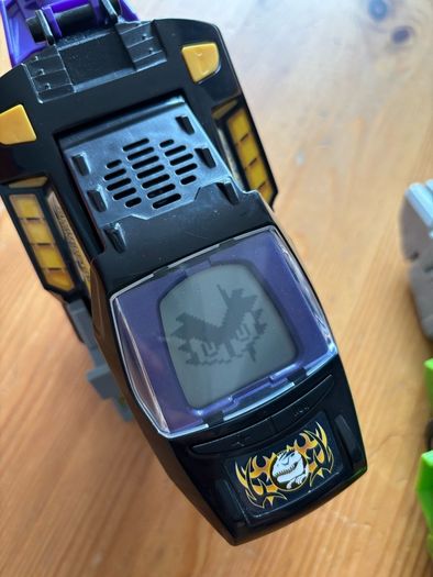 Two V-Tech Switch & Go Dinos
