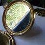 A Collection of Mid-Century Compacts. Tallent Enamel, Kigu, a Courting Couple Novelty Piece and a Henriette Pocket-Watch Compact Image 5