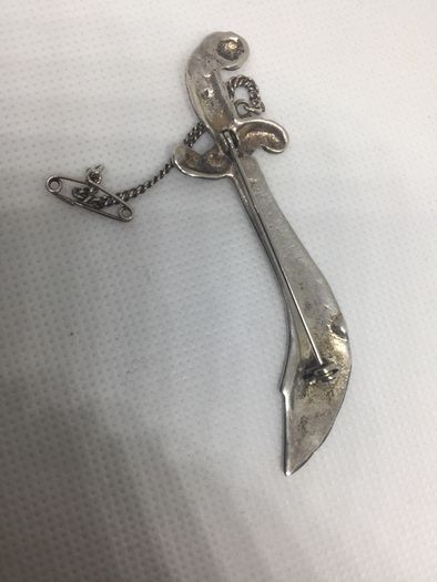 Vintage sterling silver brooch with safety chain