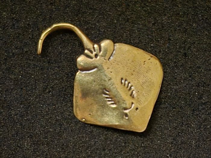 3 brass fish.