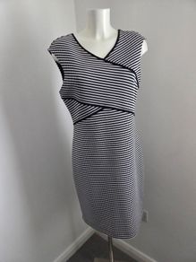 Like new. Size 14 Episode Black and White print sleeveless v-neck dress.
