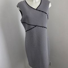 Like new. Size 14 Episode Black and White print sleeveless v-neck dress.