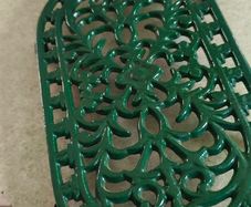 Large vintage cast iron oval dark green trivet - Openwork decoration - Parisian style - Antique French tableware - Table accessory