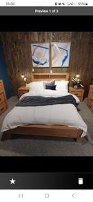 Solid wood king size bed with in built shelves at back
